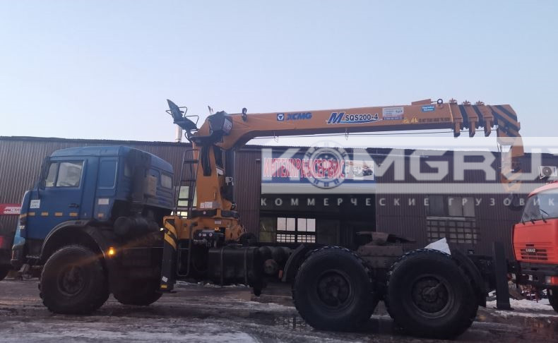 Седельный тягач КАМАЗ 65115 с КМУ  XCMG MSQS200-4