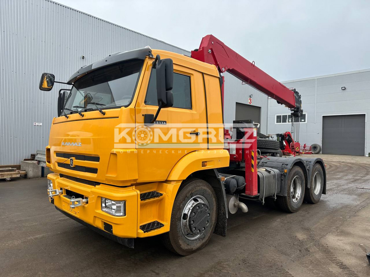 Седельный тягач КАМАЗ 65116 с КМУ HORYONG HRS 217